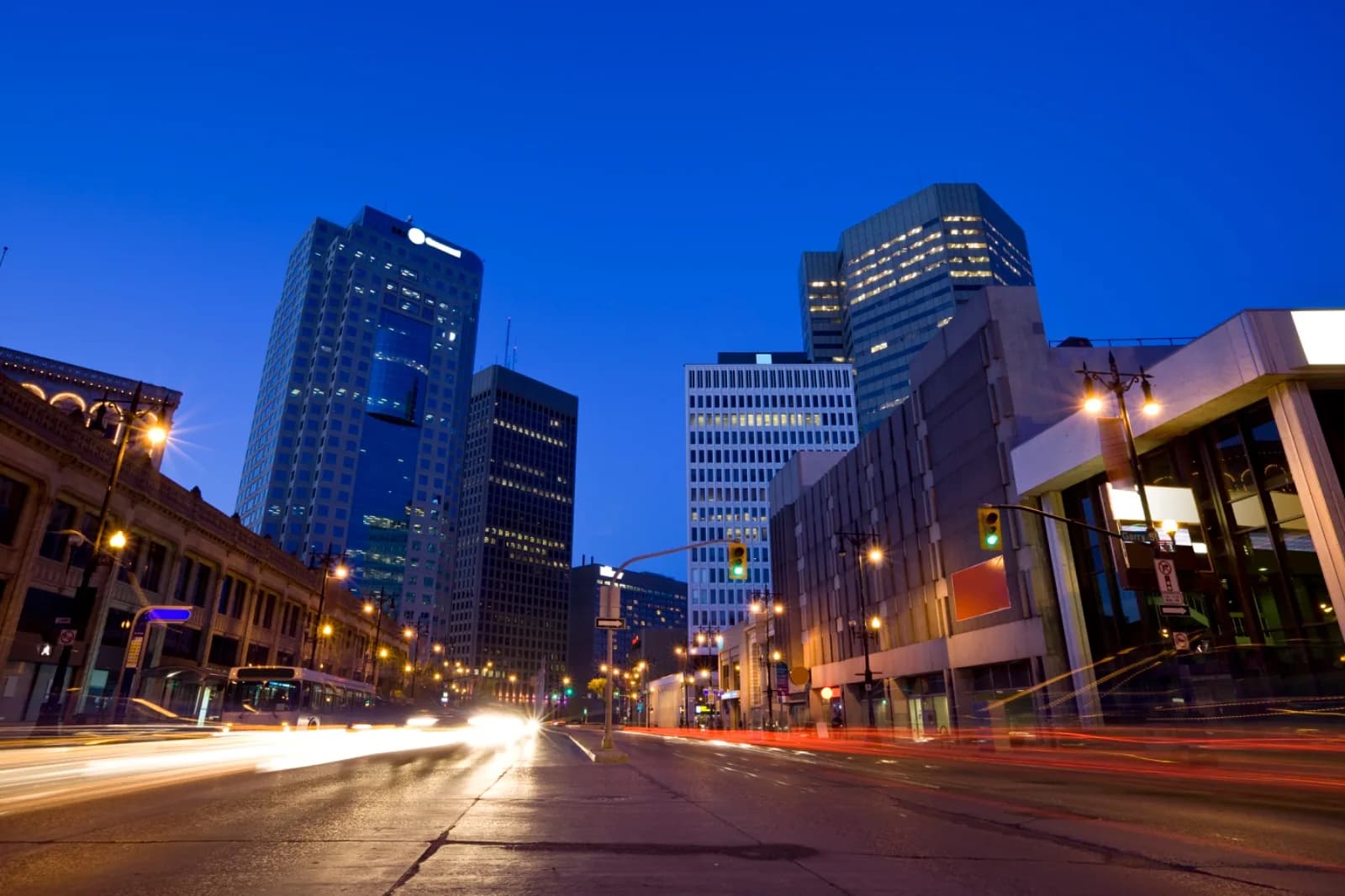 Canadian city skyline representing an Express Entry CRS planning decision