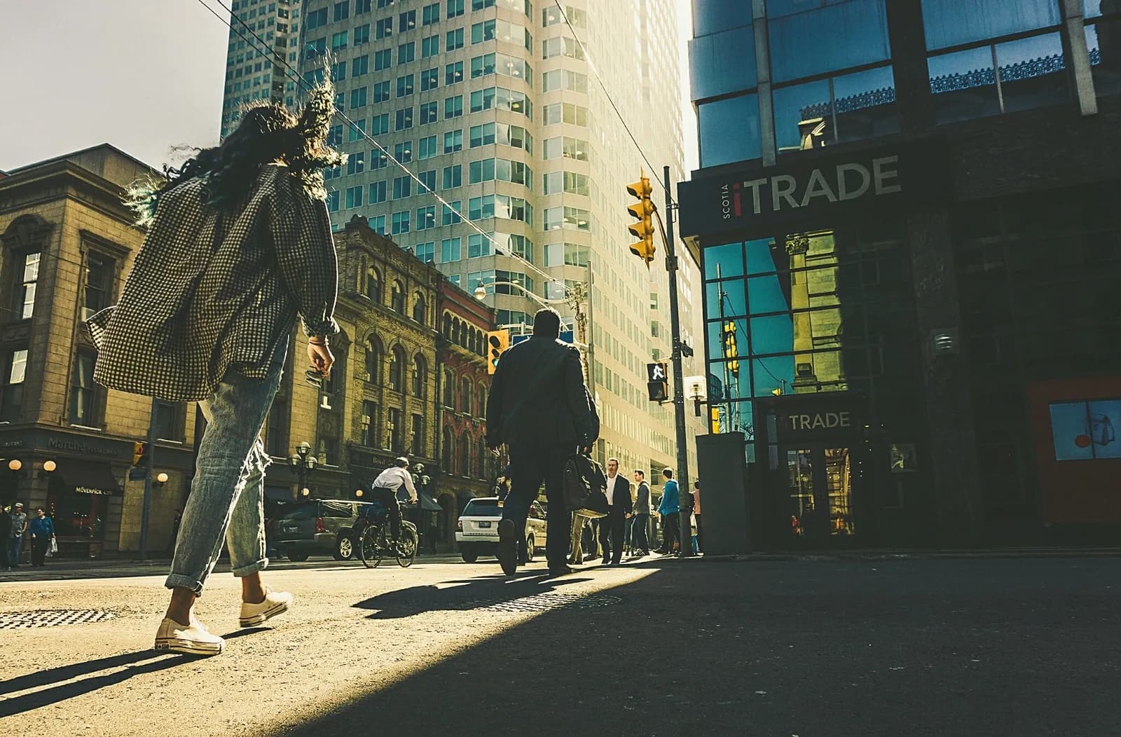 People moving through a Canadian city while planning work permit options