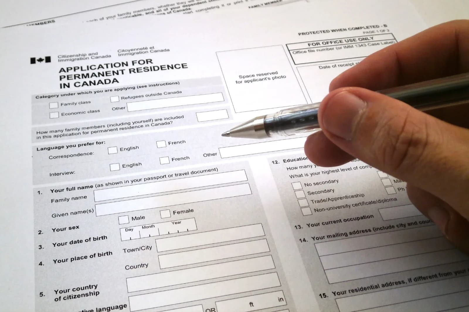 Organized immigration documents prepared for Express Entry category selection