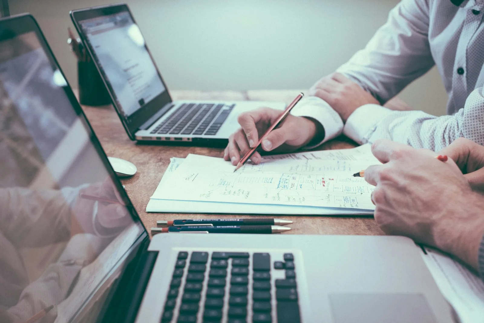 Business plan and notes on a desk